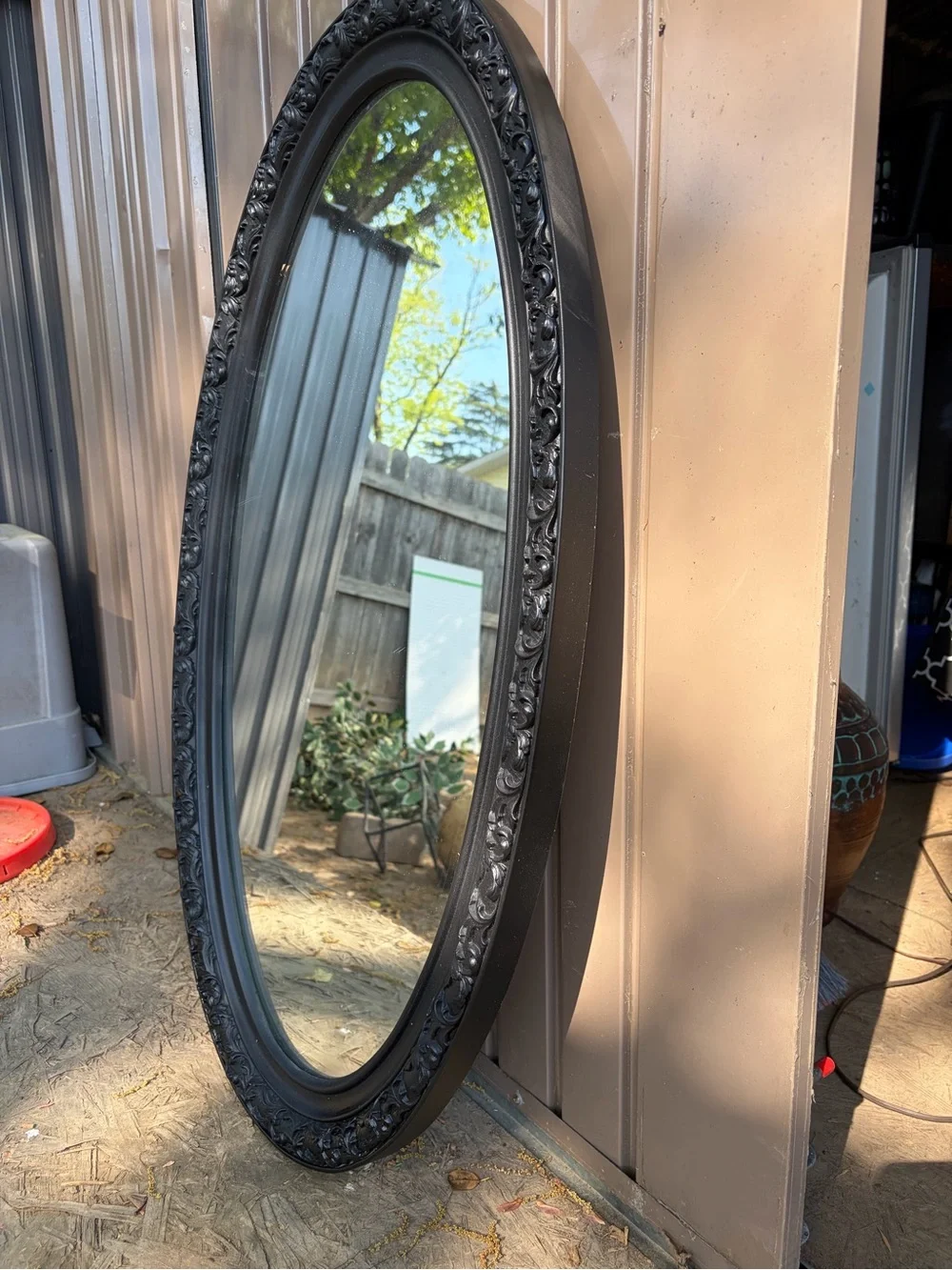 Classic Black Oval Wall Mirror with Ornate Frame